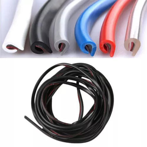 Coiled black toy car accessory wires with small connectors