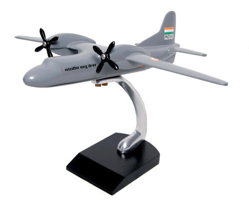 Grey RC airplane drone model with four propellers on base stand