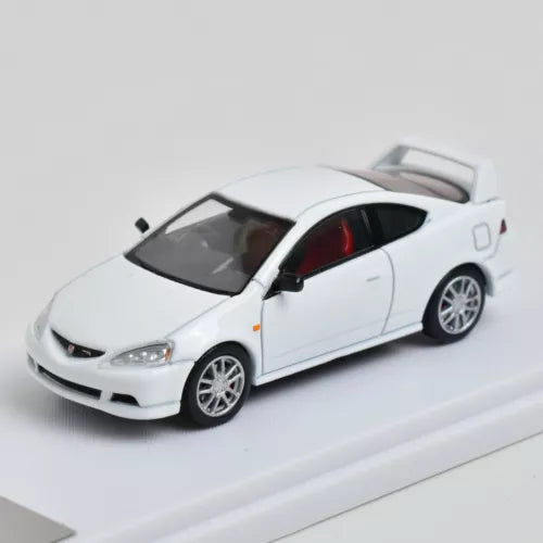 White 1/64 diecast model car with dark windows and silver wheels, Honda Integra DC5