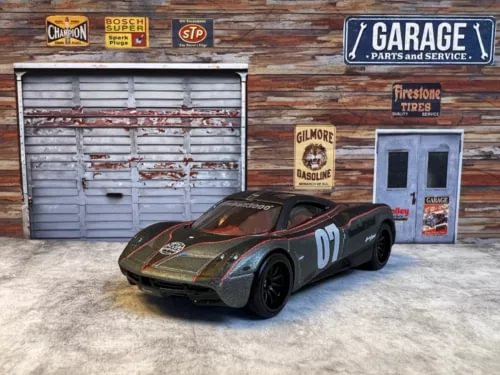 Black and gray diecast race car with number 02