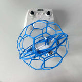 Toy racing drone with blue prop guard and remote controller