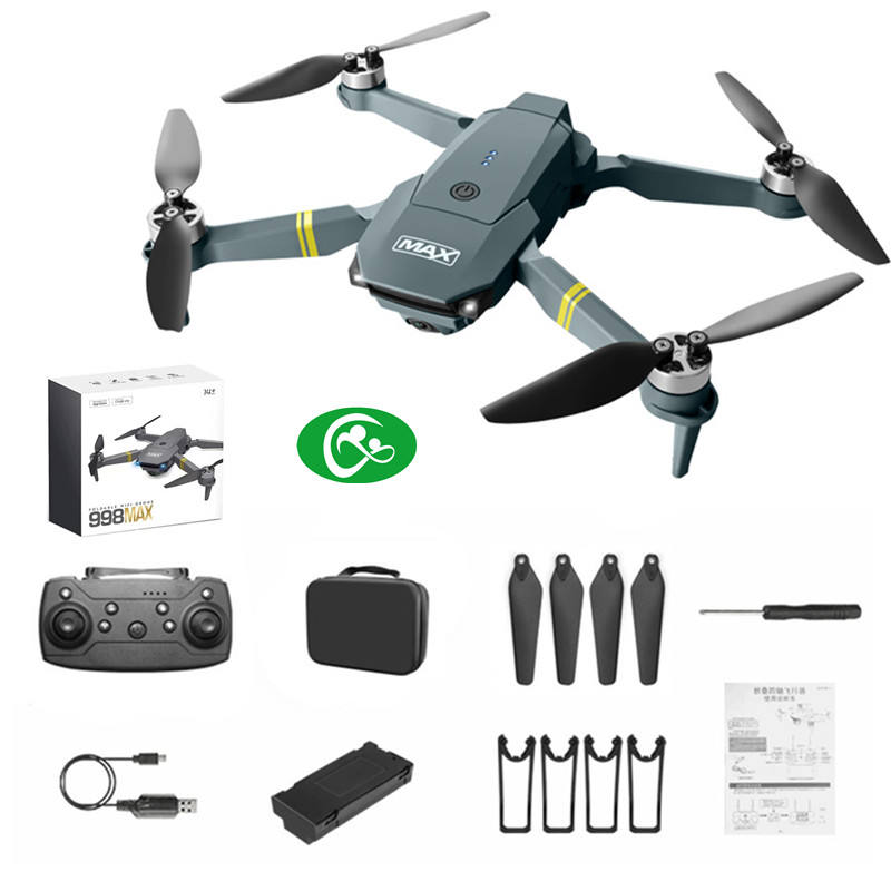 Foldable mini RC drone with quad propellers, controller, battery, and accessory kit