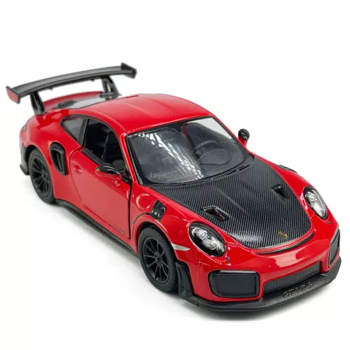 Red metal diecast model sports car with black wheels and hood vents, front three-quarter view