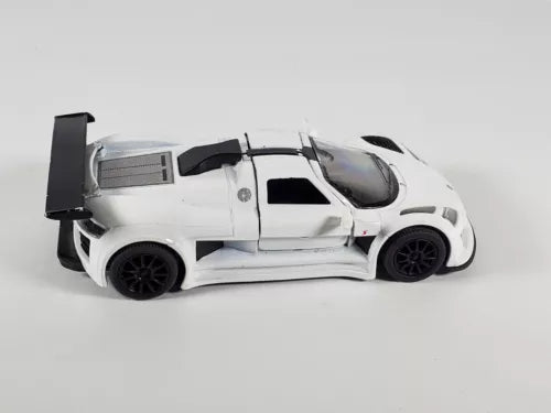 White diecast pull-back sport car with rear wing, side view