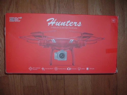 Red camera quadcopter drone retail box