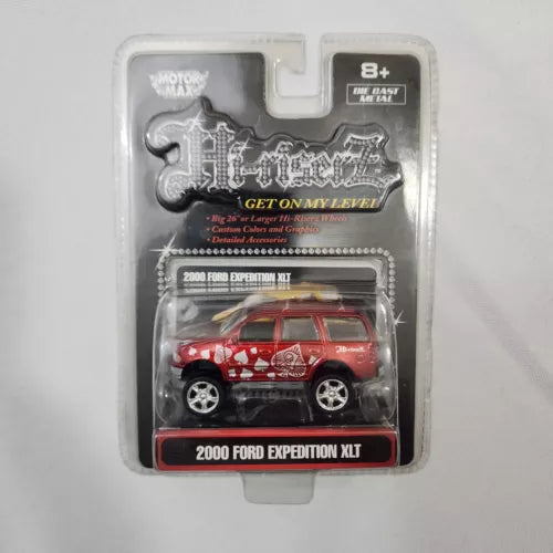 Red diecast 1/64 Ford Expedition XLT in blister packaging, 2000 model