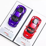 1:64 sports diecast car toy set with purple and red hardtop cars in box