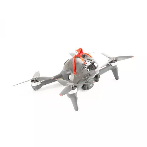 DJI FPV drone with orange frame and four propellers