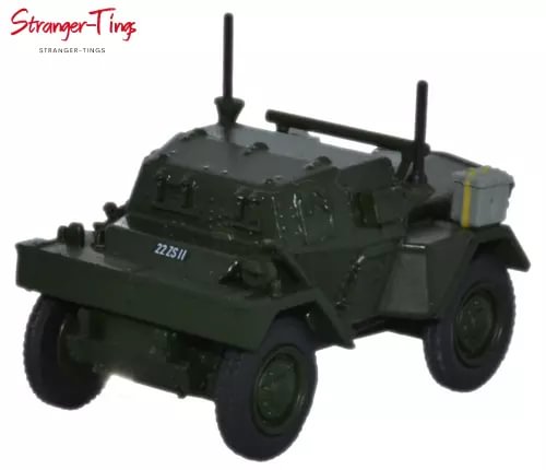 Dark green diecast army jeep model with open cab, roll bars, and side markings.