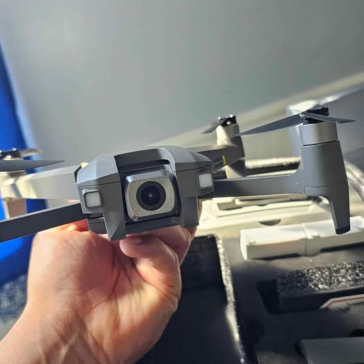 Drone front camera with visible propellers and front body housing
