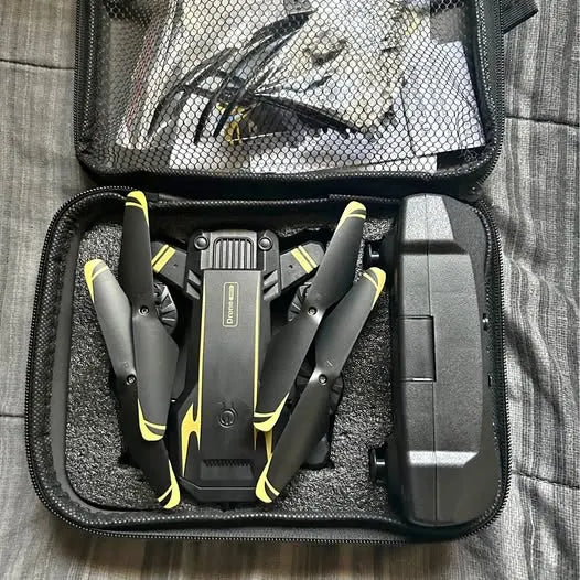 Drone kit in hard carry case with foam insert and mounted folded drone