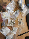 Model kit wheel and tire parts, silver metal wheels in clear bags