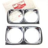 Black diecast car headlight trim set with two pairs of lens housings