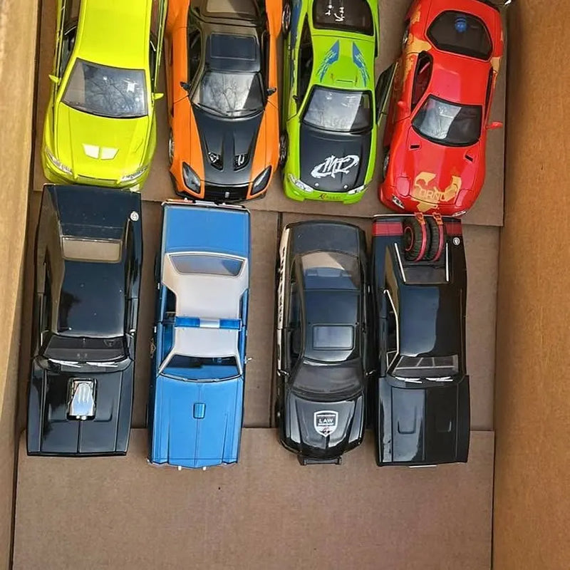 Diecast toy car assortment with 10 model cars in colorful compartments