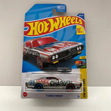 Die-cast Hot Wheels 1971 Dodge Charger toy car in blister pack, red and black