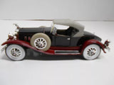 Diecast 1930 Packard boat tail parts car, maroon and black with whitewall tires