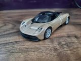 Welly diecast sports car, silver with black hood and front grille