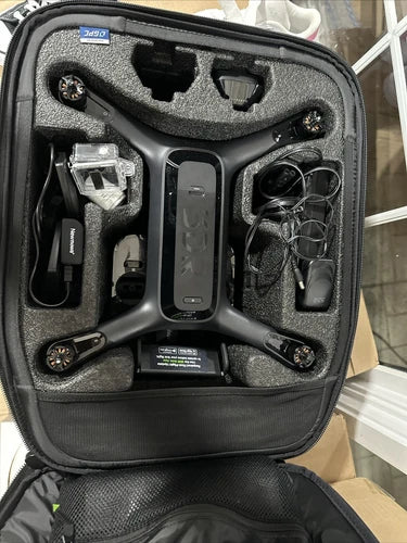 3DR Solo smart drone and accessories in black hard carrying case with foam inserts