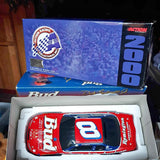 Red diecast race car with blue-and-white #8, in display box