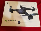 Foldable RC quadcopter drone with camera lens, shown on product box