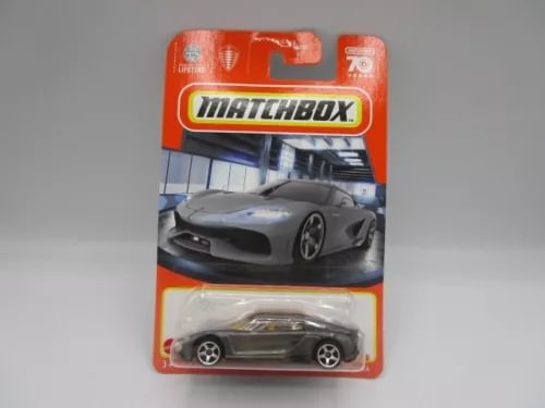 Matchbox 1:64 gray diecast sports car in blister pack, black details, visible wheels