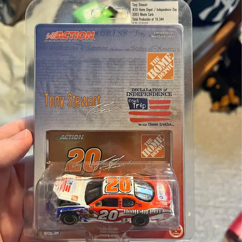 Tony Stewart #20 diecast racing car in blue retail box with Home Depot graphics