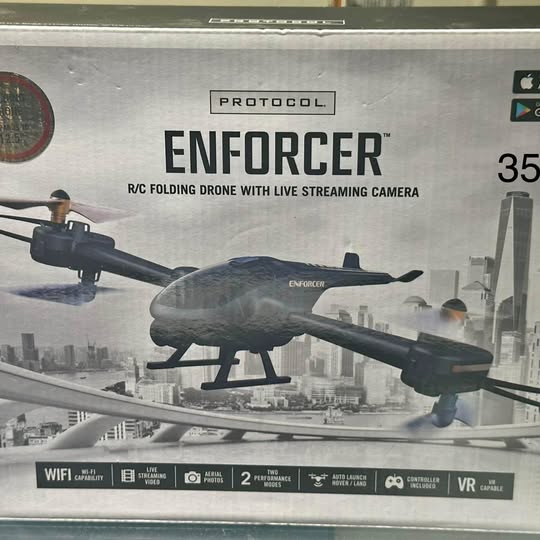 RC folding drone with live-streaming camera, dark gray body and propellers