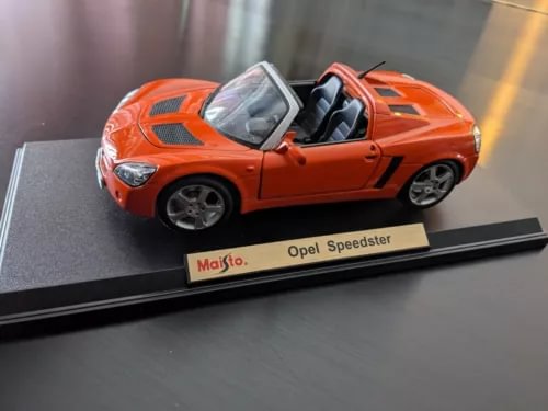 Orange Opel Speedster 1:18 diecast model car with open door