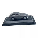 Grey diecast classic coupe car model with black interior, 1:76 scale on base