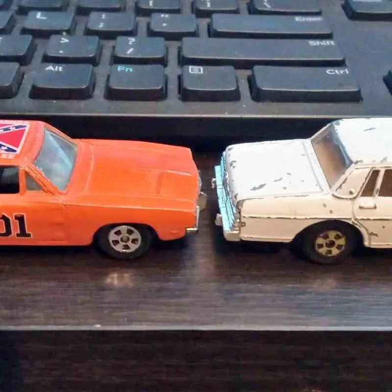 Diecast cars set with orange and white classic trucks, detailed wheels and windows