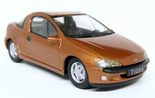 Burnt orange diecast model car with Tigra badge, front three-quarter view