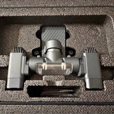 Metal drone search light mount with central lens and side bracket arms