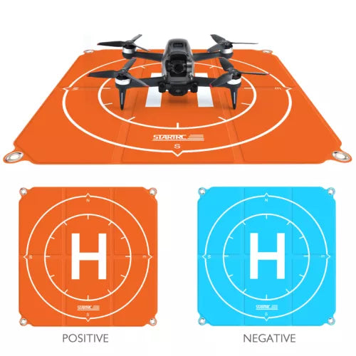 Double-sided 50 cm drone landing pad with orange and blue marked zones, corner grommets