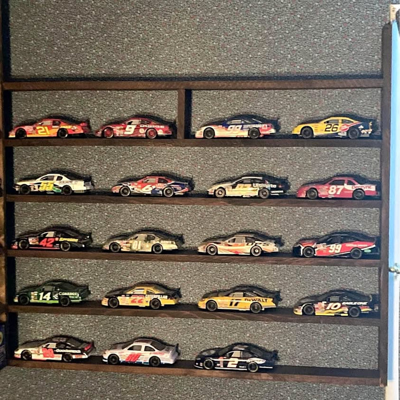 NASCAR 1/24 diecast race cars collection in various colors on display shelf