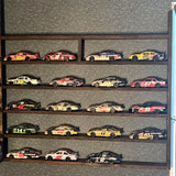 NASCAR 1/24 diecast race cars collection in various colors on display shelf