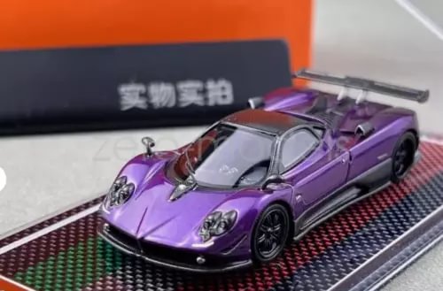 Purple racing sports model diecast resin car with black wheels, front 3/4 view