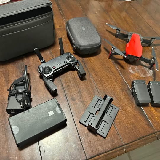 DJI Mavic Air drone with controller, batteries, chargers, and hard case