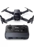 Foldable quadcopter drone with remote controller, four propellers and two joysticks