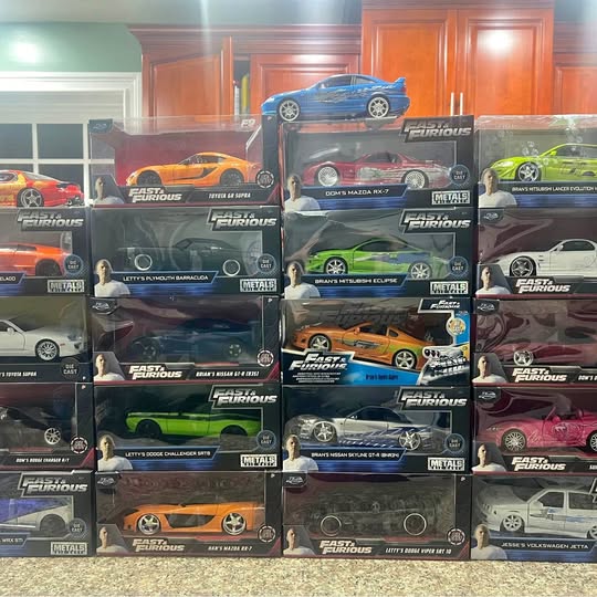 1/24 scale diecast car boxes with Fast & Furious logo and colorful toy cars