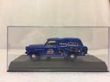 Blue diecast model panel van in display case
