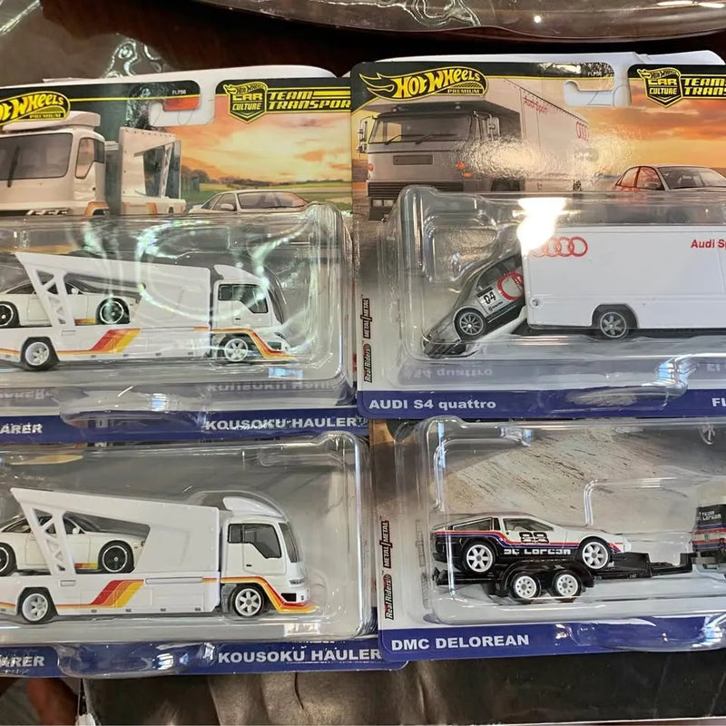 Hot Wheels Team Transport E case 1:64 diecast cars and hauler in blister packaging