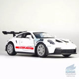 White 1/36 Porsche 911 GT3 RS diecast model car with black hood stripe