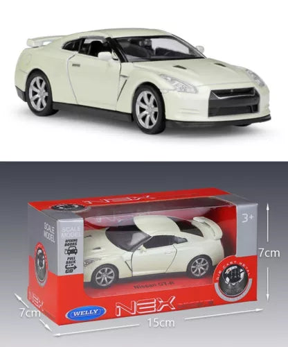 Diecast sports car model in white with alloy wheels, shown in retail box
