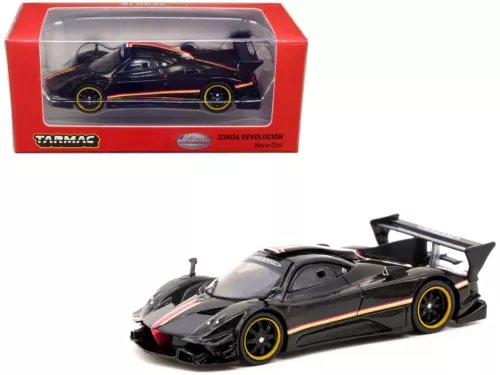 Black and gold diecast model race car with rear wing, front 3/4 view