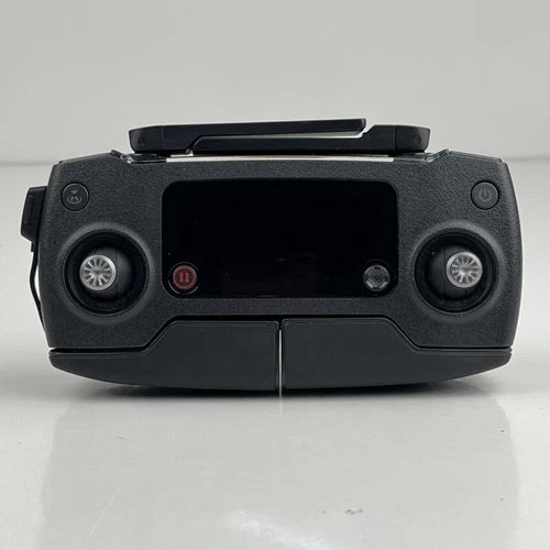 Black drone remote controller with screen and dual control sticks