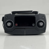 Black drone remote controller with screen and dual control sticks