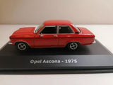 Red 1/43 scale 1975 Opel Ascona die-cast model car on display base