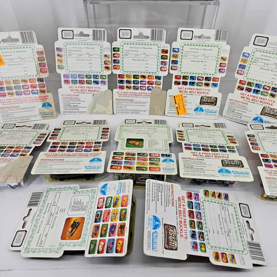 Vintage Kenner Fast 111s diecast car blister cards with colorful car graphics