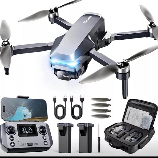 Quadcopter drone with camera, LED lights, remote controller, batteries, propellers