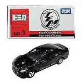 Black 1:30 diecast sedan with detailed wheels and door lines